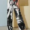 Nanu Black & Red 'Fashion' Portraits Palazzo Pants - Women