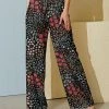 Nanu Black & Red Floral Palazzo Pants - Women